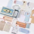 Retro utilitarian sticker set in dark teal box with vintage labels for journaling - Old Tags