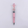 Detail of pink silicone bead pen with cute cow head topper and cow pattern spacer - Dusty Pink