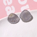 Detailed view of gray-purple resin shell charms with gold glitter for DIY crafts - Gray