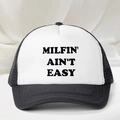 Classic black and white trucker hat with MILFIN' AIN'T EASY slogan in bold text - Black
