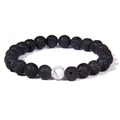 Macro shot of 8mm black volcanic lava stones with white marble turquoise bead on a bracelet - Lava Stone (Elastic)