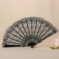 Elegant black lace folding fan with intricate gold hollow patterns and floral background - Single Layer Orchid Fan / Black