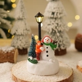 Luminous snowman and child Christmas miniature scene with glowing street lamp - Snowman