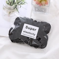 Detail of high elasticity black seamless hair ties in transparent packaging with label - 50 Pcs Bag / Black No.2