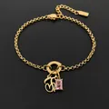 14K gold-plated stainless steel bracelet with letter charm and pink stone detail - Letter J