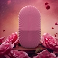 Pink facial ice roller shown with roses to highlight depuffing beauty skincare benefits - Shell Texture / Rose Pink