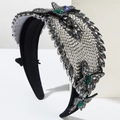 Close-up of luxury velvet headband with green rhinestone butterflies and crystals - Gray