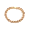Detailed view of a gold flower bracelet featuring delicate pink crystals and a secure clasp - Gold Magenta Zirconia Bracelet