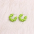 Green twisted C-shaped acrylic hoop earrings with a matte finish on faux fur - Small Fruit Green Twisted