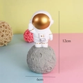 Astronaut on moon figurine cake topper, resin space themed party decoration, 12cm height - Resin Gold Planet Astronaut