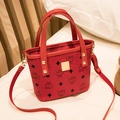 Red monogram bucket bag with gold hardware and adjustable crossbody strap - Red Small