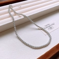Elegant silver grey pearl necklace with adjustable metal clasp on jewelry display - Necklace / Grey-4mm