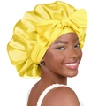 Silky yellow satin sleep bonnet with a large bow detail for hair care and beauty - Large / Yellow