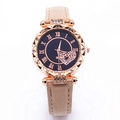 Detail of rose gold bezel with rhinestones and navy dial with Roman numerals - Beige