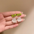 Forest green bow earrings with translucent white rose pendant and gold-tone finish - Green Bow White Rose Style