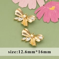 Golden bow pendant connector with white zircon stones for DIY jewelry, size 12.6mm x 16mm - ME5605A - Gold Bow Knot - 1pc