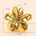 Polierte goldene Blumen-Haarklammer aus Metall mit Maßen von 8,5 cm mal 7,5 cm - Gold