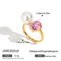 Detail of 18K gold stainless steel ring with pink zircon and white pearl accents - Gold Plated Pink Zirconia And Pearl Style (JDR0302018)