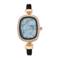 Women's rose gold oval watch with marble dial and rhinestone bezel on black strap - Black