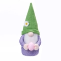 Easter gnome plush in green daisy hat and purple body holding a pink polka dot egg - Easter Egg Daisy Style / Green
