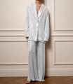 Détail d'un ensemble blazer et pantalon large à sequins argentés scintillants chic - Ensemble de Costume Blanc Argenté