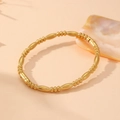 Detail of gold bamboo-style link bracelet with circular beads and secure clasp closure - Gold Alternating Oval & Round Bead Style (S502)