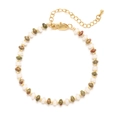 Détail d'un bracelet de style bohème en pierres naturelles avec fermoir doré - Unakite avec Blanc