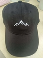 Black cotton baseball cap featuring white mountain range embroidery on the front - Adjustable Free Size / Black