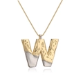 Two-tone gold and silver letter W pendant necklace with hammer-textured lava finish - Letter W