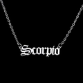 Detailed close-up of Scorpio gothic letter pendant in silver-tone stainless steel - Scorpio-Silver