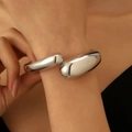 Minimalist silver open bangle with polished liquid metal design and chunky spring style - Water Drop Open Bangle (6695) / Silver