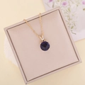 Elegant gold twist chain necklace with a dark blue faceted crystal pendant in a gift box - Blue