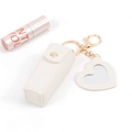White leather mini lipstick pouch with gold keychain and heart-shaped mirror charm - No Logo White