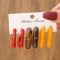 Detail of three pairs of C-shaped resin earrings in red, brown, and yellow marble patterns - 3 Pairs Red Brown Yellow Marble Set (E0266-1)