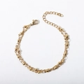 Detailed view of double-layered gold chain bracelet with beads and lobster clasp closure - 17+5cm / Cross Bead Chain + Polished Ball Bracelet / Gold
