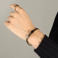 Vergulde armband en ring set met rechthoekige zwarte edelstenen in een vintage stijl - 15+5cm / Zwarte Armband