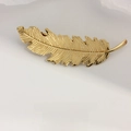 Elegante fermaglio per capelli a piuma dorata con dettagli in lega dal design minimal - Foglia Oro