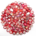 Macro shot of assorted red glass beads with silver metal cores for DIY jewelry design - Red Multicolor / Red (10g)