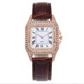 Detail of rose gold square watch case with crystal bezel and brown leather strap - Square Quartz Watch / Coffee