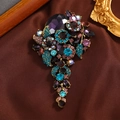Baroque vintage brooch with purple gemstones and blue tassels on brown silk background - Style 5 (Deep Purple Gem Triangle)