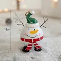 Spherical Christmas snowman figurine with green hat and striped scarf holiday decor - White Round Christmas Snowman
