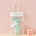 Light green coral fleece towel in rabbit shape with transparent gift bag packaging - Light Green + OPP Handbag