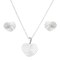 Detail shot of heart-shaped swirl necklace and earrings set in polished silver finish - Silver Heart