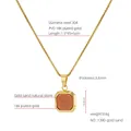 Macro detail of square gold sand stone pendant on an 18K gold plated steel chain - Red Gold Sandstone Style