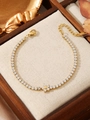 Elegant gold titanium steel tennis bracelet with white zircon flower charm and lobster clasp - White Flower Style