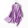 Thick purple wool blend scarf with fringe tassels shown on a white knitted sweater - Taro Purple