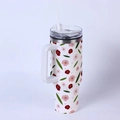 Detail of 40oz stainless steel tumbler with floral pattern and white handle and straw - Pink Red Floral/White