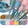 Close-up of blue nail glitter application from a 12-slot colorful laser sequin set - 12 Compartment Colorful Glitter Set (JX03)