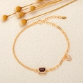 Detail of gold chain bracelet with rectangle red gemstone and sparkling heart pendant - Gold Plated Natural Garnet