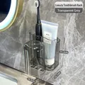 Smoky grey wall-mounted toothbrush holder and cup set measuring 11.2 x 12.1 x 10.3 CM - Transparent Grey Storage Rack + Cup